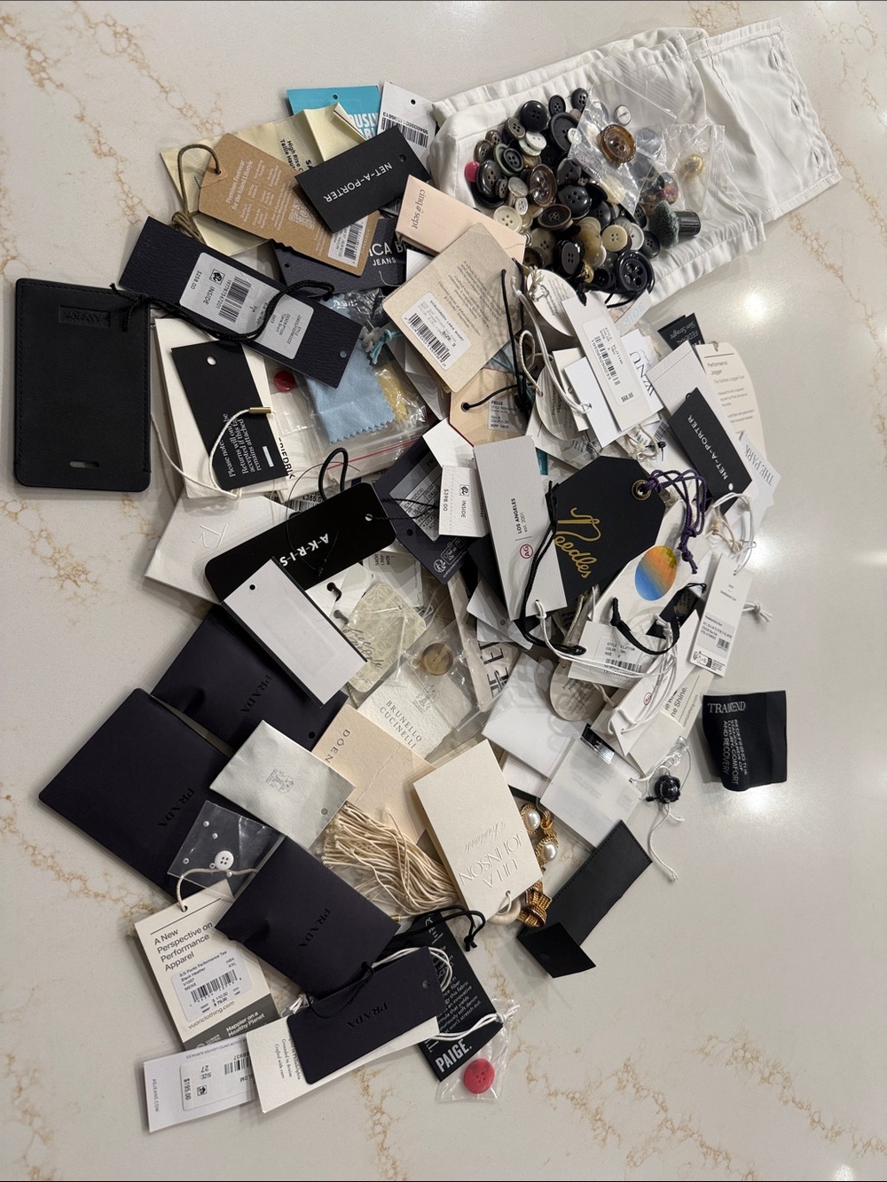 Assorted Clothing Tags and Buttons Lot - Black, White, Cream